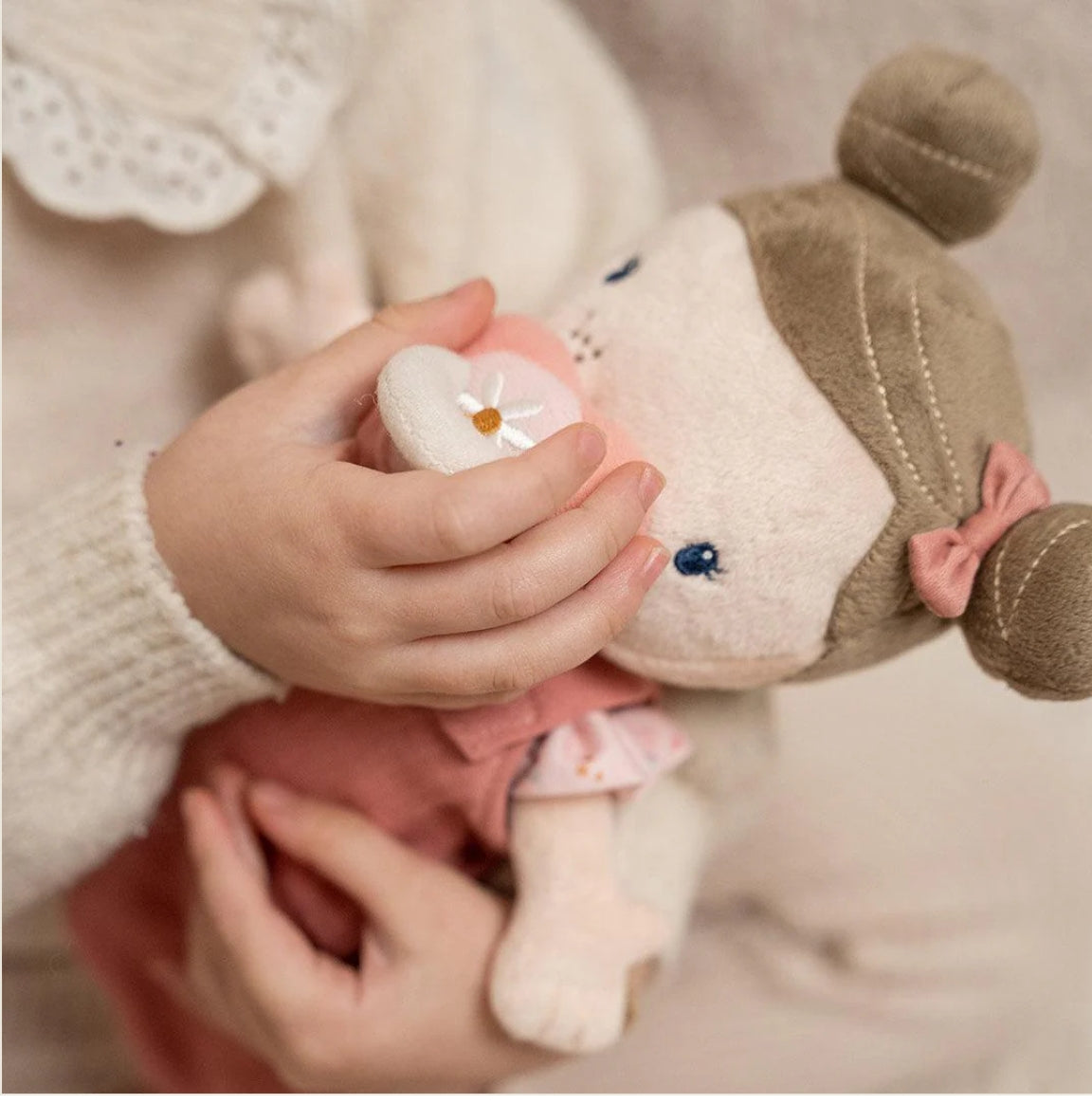 Soft toys and dolls