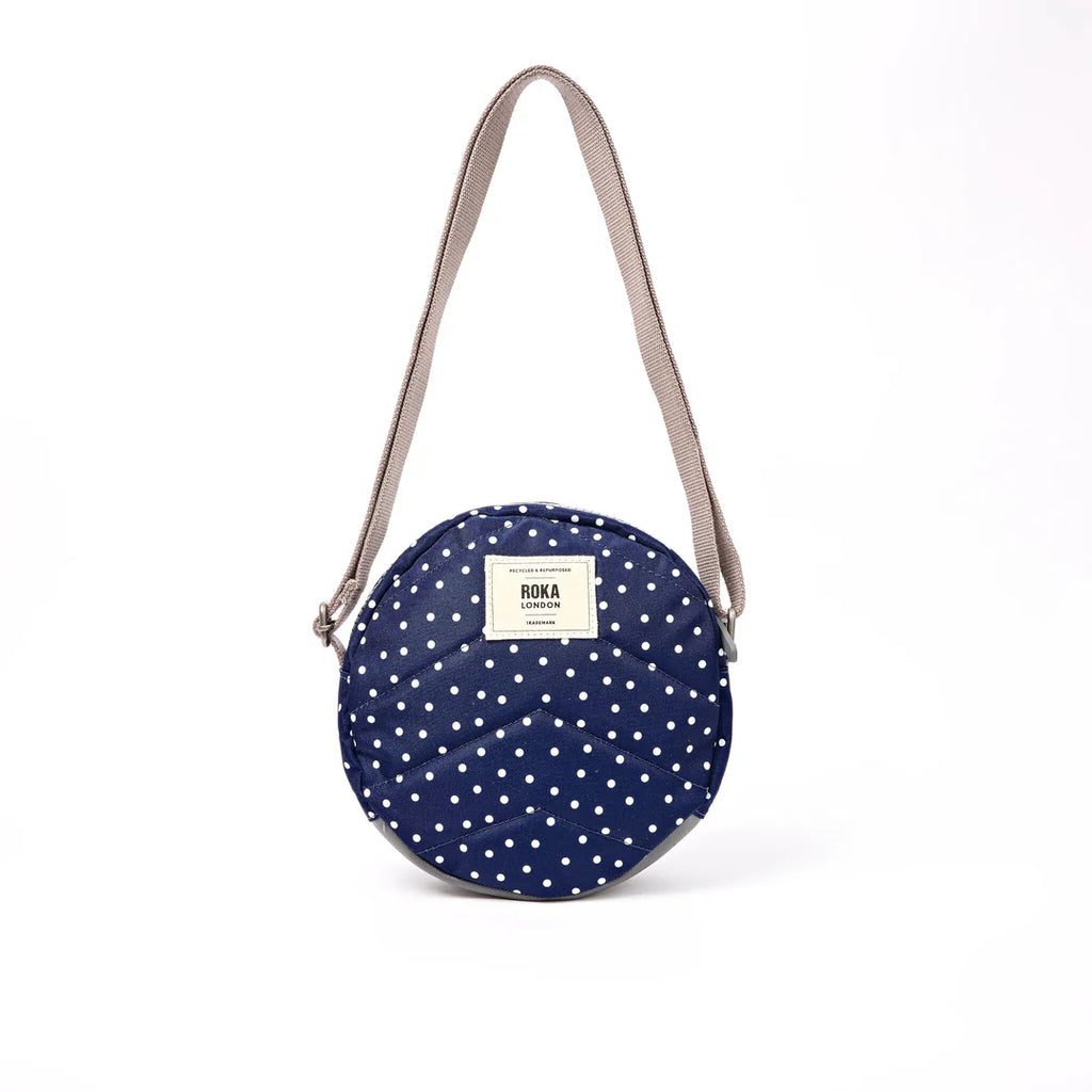Paddington crossbody bag in navy polka dot