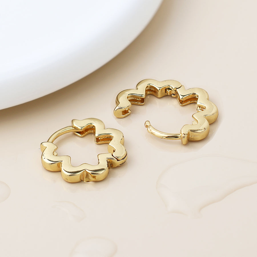 Pom zig zag earrings