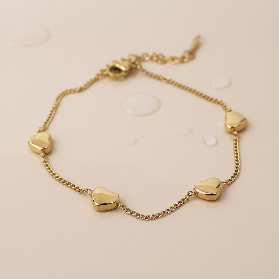 Gold plated heart station bracelet