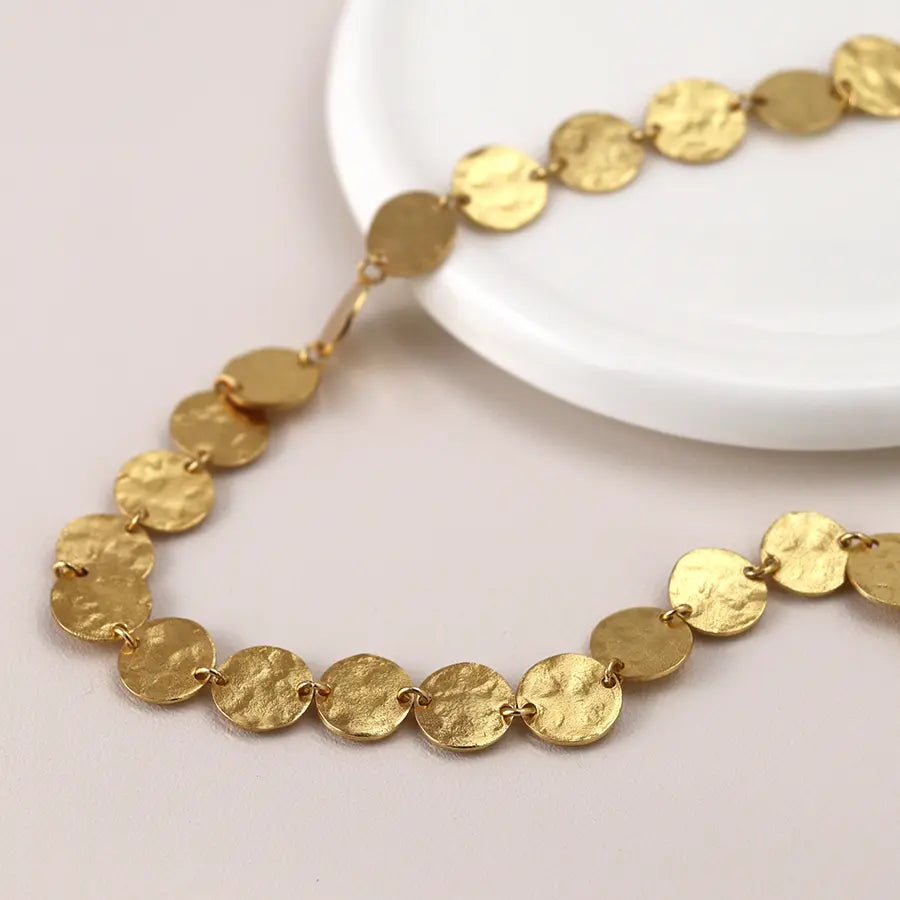 Luxury hammered multi disc necklace
