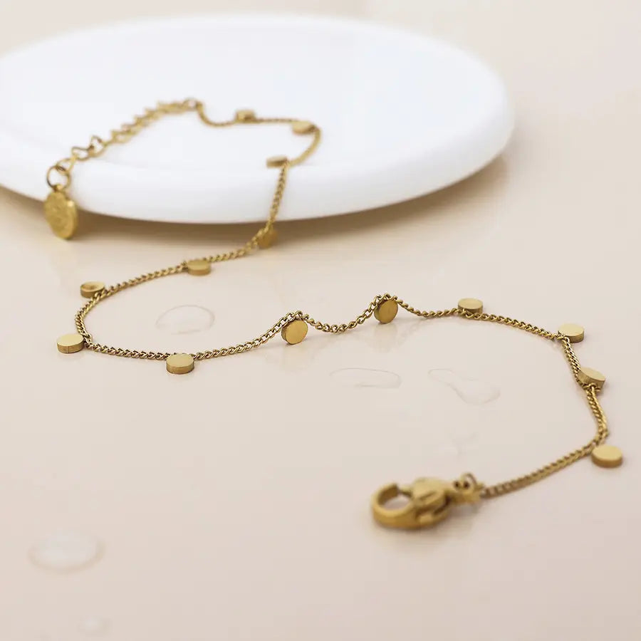 Gold disc charm bracelet