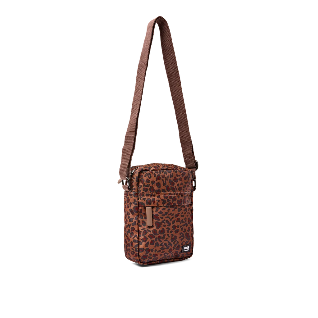 Bond pocket crossbody bag in mini leopard
