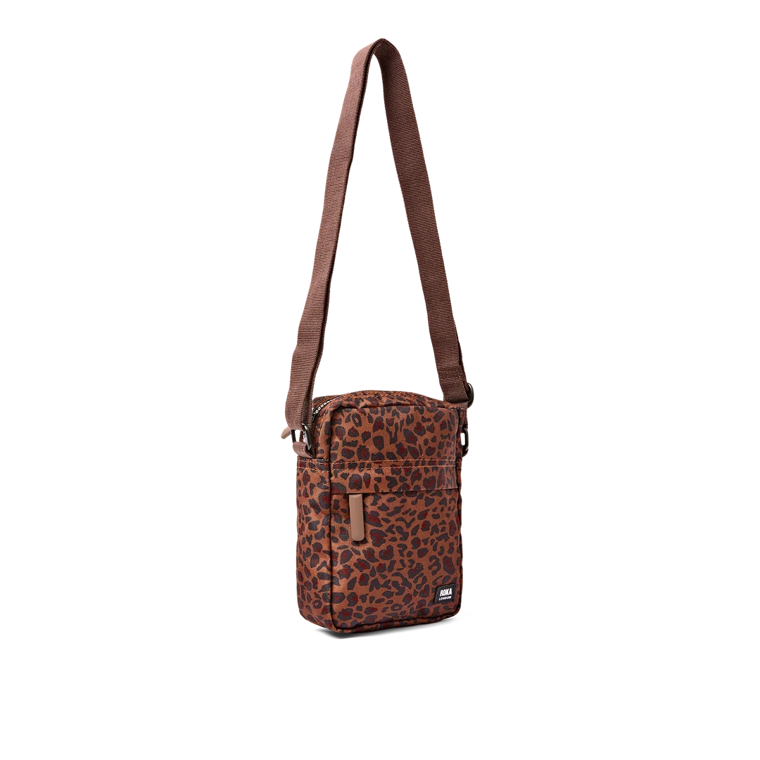 Bond pocket crossbody bag in mini leopard